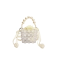 Mini transparent beaded handbag for girls featuring large pearl handles and cream drawstring - Clear White