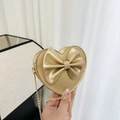 Matte gold heart-shaped crossbody bag for girls with large bow and metal chain - Gold