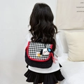 Kids quilted backpack with black heart pattern and cute white puppy keychain charm - Small / Black
