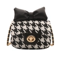 Mini girls crossbody bag with houndstooth pattern and a large black bow accent - Black