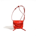 Mini red patent leather crossbody bag for kids with cute bow detail and glossy finish - Red
