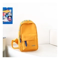 Close-up of a yellow mini kids' chest bag showing adjustable blue straps and zippers - Small / Yellow
