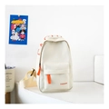 Close-up of white minimalist kids chest bag with orange zipper and FASHION lettering - Small / White