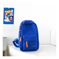 Detail of royal blue nylon chest bag featuring orange zippers and fashion lettering - Small / Blue