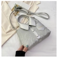 Silver shirt-shaped bucket bag with button detail and textured metallic finish - Silver