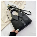 Black shirt-shaped bucket bag with unique collar design and marble leather texture - Black