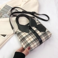 Creative shirt-style plaid handbag with black leather trim and top handle in beige check - Black