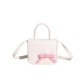 Mini cream crossbody bag with pink bow accent and top handle for sweet style - Off White