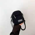 Minimalist black corduroy square crossbody bag with fashion patch and zipper details - Black