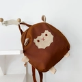 Zaino per bambini in tela marrone caffè con una simpatica toppa a forma di biscotto - Marrone