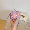 Mini lichtpaarse lederen tas met roze strik en handvat voor meisjes en peuters - Paars