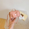 Pink mini crossbody bag for girls with large decorative bow and textured faux leather - Pink