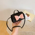 Mini PU crossbody bag for girls in black with a cute pink decorative bow accent - Black