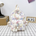 Mini beige toddler backpack with colorful heart patterns and 3D plush bunny charm - Off White