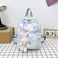 Cute light blue kids canvas backpack with heart patterns and plush bunny charm - Green