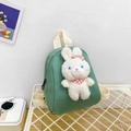 Cute green canvas backpack for children featuring a 3D white plush bunny with a pink bow - Green