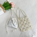 Elegant white beaded pearl handbag with silk drawstring inner bag and short top handle - Off White