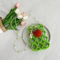 Handmade beaded crossbody bag for girls with green floral beads and crochet strawberry charm - Green