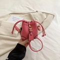Pink drawstring mini bucket bag for girls featuring high-quality lychee texture leather - Rose Red