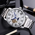 Dettaglio orologio automatico con fasi lunari e cuore aperto su taccuino in pelle nera - Quadrante Bianco