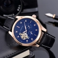 Detailed close-up of a blue sunburst dial mechanical watch with rose gold case and leather strap - Rose Gold Black Dial Black Strap