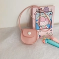 Pink PU leather mini crossbody bag for girls with a round button and saddle shape design - Pink