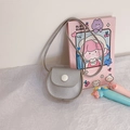 Silver mini PU crossbody coin purse for girls featuring a snap flap and long shoulder strap - Silver