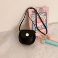Cute black round PU leather crossbody bag for girls with white button closure and strap - Black