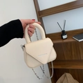 Retro cream-colored mini crossbody bag with silver chain strap and fashion logo - Off White