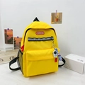 Bright yellow canvas children's backpack with safety reflective strip and astronaut charm - Large / Yellow