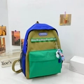 Kids canvas backpack in blue and green colorblock design with astronaut keychain - Large / Blue