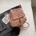 Pink quilted mini backpack with gold metal turn-lock and chain straps in PU leather - Pink
