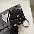 Elegant black quilted PU backpack with golden chain straps and twist lock closure - Black