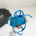 Mini sky blue crossbody bag with white stitching and drawstring inner lining - Blue