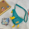 Simpatica borsa a tracolla a forma di anatra turchese in tela con ali gialle e cinturino - Verde