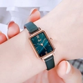Elegant rectangle watch with green malachite dial and green leather strap on wrist - Rose Gold Case Green Dial Green Strap