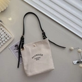 Cream canvas crossbody bag for girls with black adjustable strap and logo print - Black
