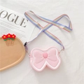 Pink bow-shaped silicone crossbody bag for girls with adjustable rainbow fabric strap - Solid Bow Decor Pink