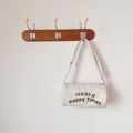 Sac bandoulière cylindrique en toile blanche avec lettrage noir TEH.GO.U Happy Times - Blanc