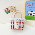 Cute girl's straw handbag with red plaid weave and a plush bunny charm accessory - Red and White