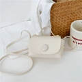 Mini cream PU leather crossbody bag for girls with top handle and round buckle decoration - Off White