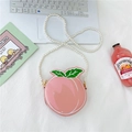 Pink peach-shaped crossbody bag with glossy finish and white pearl chain strap - Pink