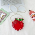 Cute red peach shaped crossbody bag with pearl chain strap and glossy finish - Red