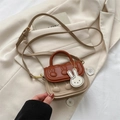 Brown and beige mini handbag with 3D bunny embossing and matching rabbit charm - Brown