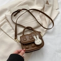 Brown mini crossbody bag for girls with rabbit relief design and cute bunny pendant - Coffee
