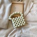 Mini cream pearl beaded handbag with circular handle for girls and stylish summer outfits - Cream