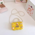 Bright yellow silicone jelly bag for girls featuring pearl handle and cute rabbit charms - Yellow