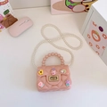 Pink silicone mini jelly bag for girls with cute cartoon flowers and pearl handle strap - Pink