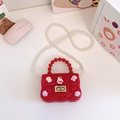 Minibolso rojo de silicona con cadena de perlas y dijes de conejo de dibujos - Rojo
