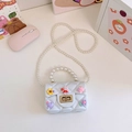 White quilted rabbit crossbody bag with pearl handle and charms for young girls - White